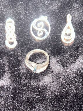 Lot of 4 silver & diamond pieces of jewelry - 3 pendants 1 ring